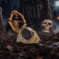 Brass BOBER finger knife in a Halloween graveyard scene